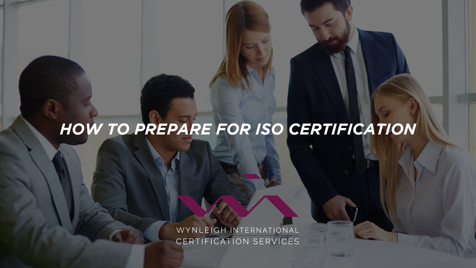 A banner image designed specifically for the Wynleigh International blog. The background image shows a group of business people working to prepare for their upcoming ISO Certification Audit. There is a text overlay that reads: "How to Prepare for ISO Certification